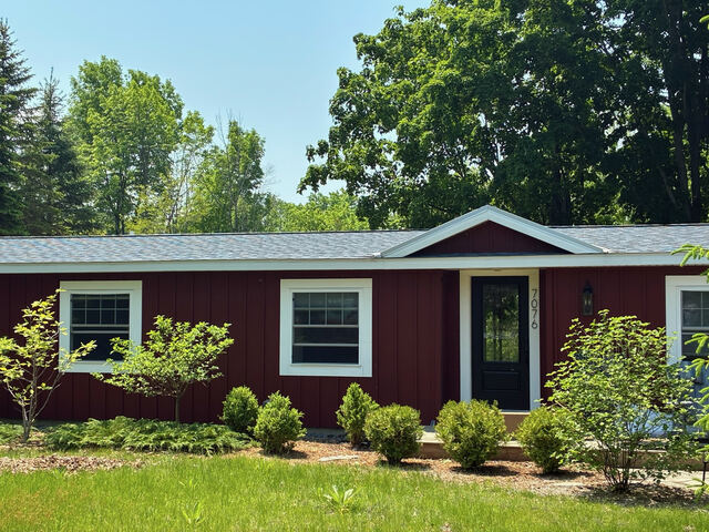Daytime exterior with trimmed landscaping