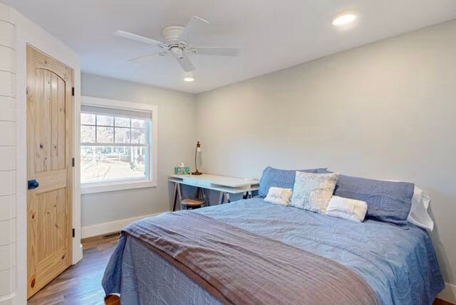 Bedroom with blue bedding