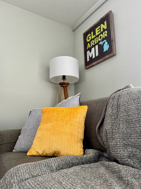 Cozy reading corner with Glen Arbor Michigan sign