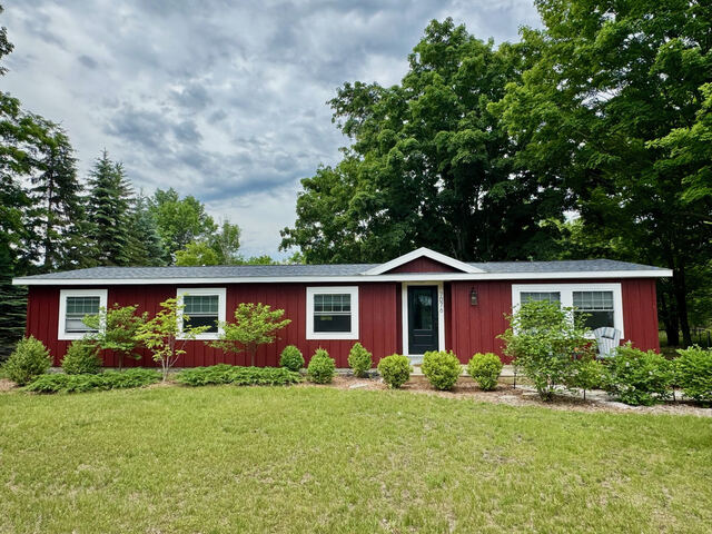 Full front lawn in summer bloom